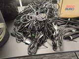 a pile of wires on a table in a room