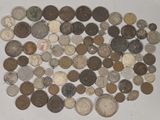 a lot of coins that are on the table
