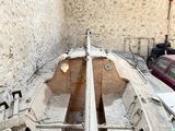 a boat that is sitting in the middle of a building