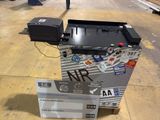 a box with stickers on it sitting on the floor