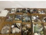 many boxes of assorted items sitting on a table