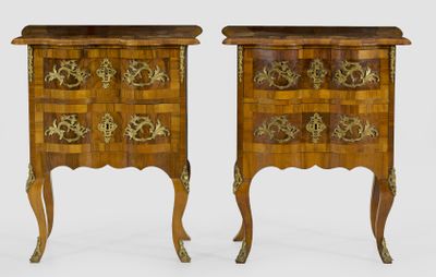 pair of louis xv style commodes in walnut and marquet
