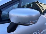a close up of a side view mirror on a car