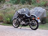 a motorcycle that is parked on the side of the road