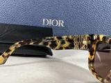a close up of a pair of sunglasses sitting on top of a table