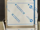 a picture of a box with a blue ribbon on top of it