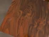 a close up of a piece of wood on a table