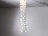 a chandelier hanging from the ceiling in a room