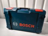 a blue case with a bosch logo on it sitting on a table