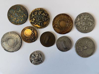 a lot of coins that are sitting on a table