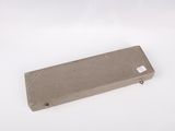 a small piece of cardboard on a white surface
