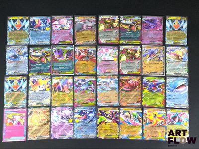 de nombreux types de cartes Pokémon exposées sur une table