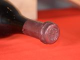 a bottle of wine that is sitting on a table