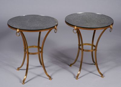 pair of brass and black marble side tables
