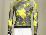 a mannequin wearing a yellow and black hoodie