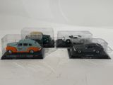 three different models of cars in a display case on a white surface