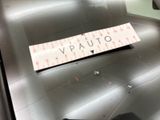 a sticker that says vauto on it on the windshield of a car