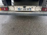 an image of a flatbed truck parked on the street