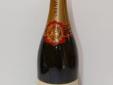 an image of a bottle of champagne on a white surface