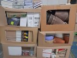 boxes stacked on top of each other on a pallet in a warehouse
