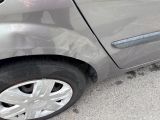 a close up of a car that has a dent in it