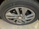 a close up of a tire on a car