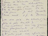 a letter written in purple ink on a piece of paper