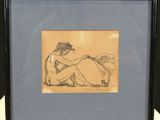 framed drawing of a nude woman sitting on the ground