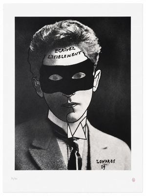 black and white photograph of a man in a suit with a mask on his head