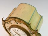 a clock that is sitting on top of a table