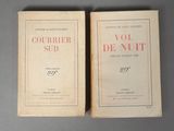 pair of two books sitting on top of a table next to each other