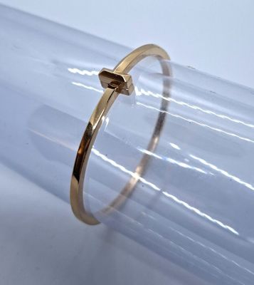 TIFFANY & Co, modèle T1 BRACELET rigide ouvrant à charnière …