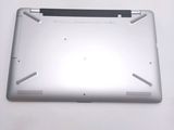 a close up of a silver laptop computer on a table