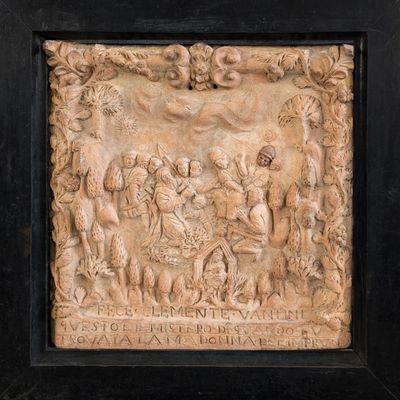 an image of a relief of a group of people in a garden