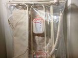 a bag of toiletries sitting on a shelf next to a toilet
