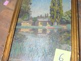 une photo d'un tableau posé sur une table, avec une étiquette de prix dessus