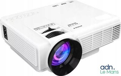 a white projector sitting on top of a table next to a camera