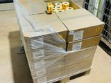 a box of rolls of toilet paper on a pallet