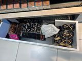 a lot of chocolates in a box on the counter