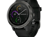 a garmin smart watch on display on a white background