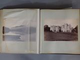 an open book with a picture of a castle in the background