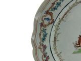 an image of a plate with a deer and flowers on it