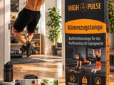 a man doing a pull up on a pull up bar in a living room