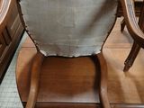 a chair that is sitting in the middle of a room