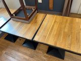 a wooden table with a mirror on top of it