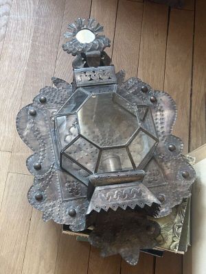 a clock that is on the wall on the floor