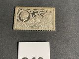 three different types of stamps on a table with a price tag
