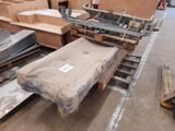 a lot of boxes that are on a pallet in a warehouse
