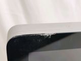 a close up of a cell phone with a broken screen