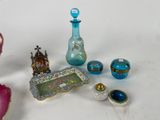 a lot of glass items that are on the table
